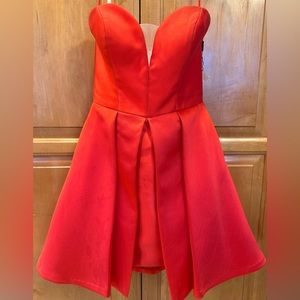 Once used red short formal dress. Size 6 In Phase Fashion brand